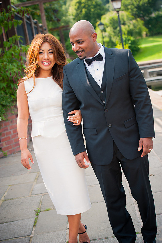 The bride and groom walking by the canal after their wedding ceremony at the Lion Quays, Oswestry, Shropshire