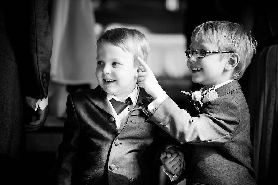 Young boys enjoying a wedding at Holt Lodge.