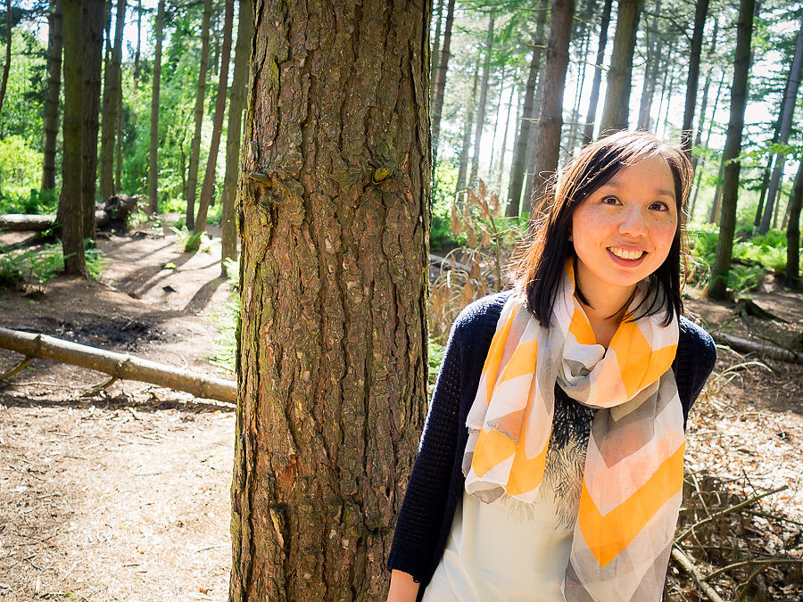 Photograph of Lisa by a tree in Delamere Forest. Celynnen Photography. Pre Wedding Shoot. Dan & Lisa