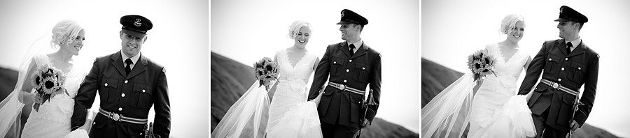 Bride and groom on the beach at Nant Gwrtheyrn by Celynnen Photography