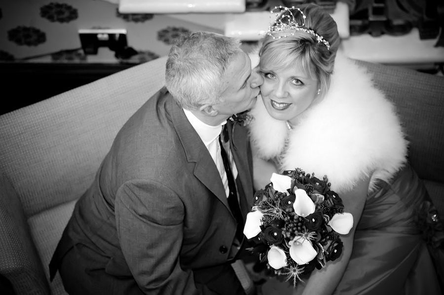 bride and groom kissing at the Chester Grosvenor
