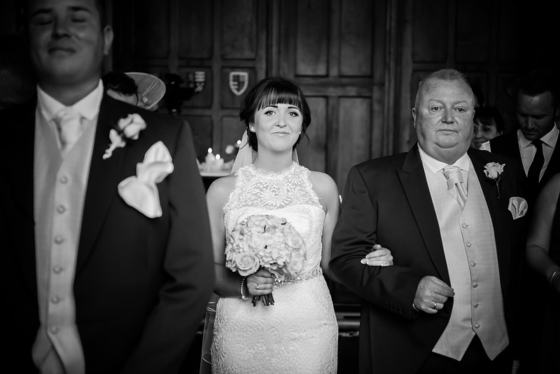 the bride walking up the aisle. Wedding in Chateaux Rhianfa, Anglesey. Wedding Photographer, Celynnen Photography