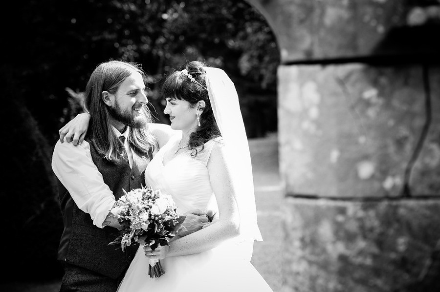 Black and white image of bride and groom at their wedding at Gwydir Castle, by Celynnen Photography, North Wales wedding photographer of the year