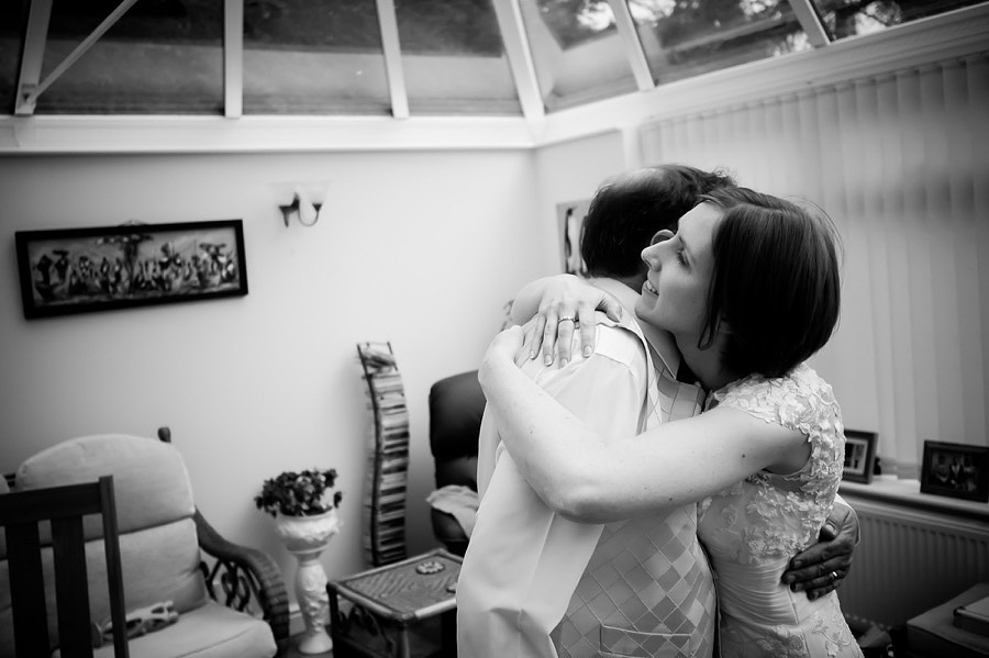 A black & white picture of Mair with her Father prior to leaving for the church.