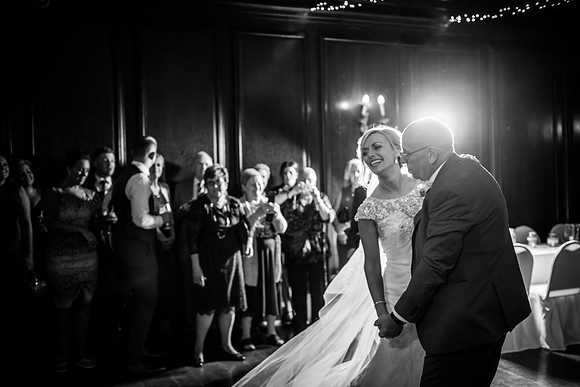 black and white picture of a Bride and father of the bride dance on her wedding day in Pormeirion