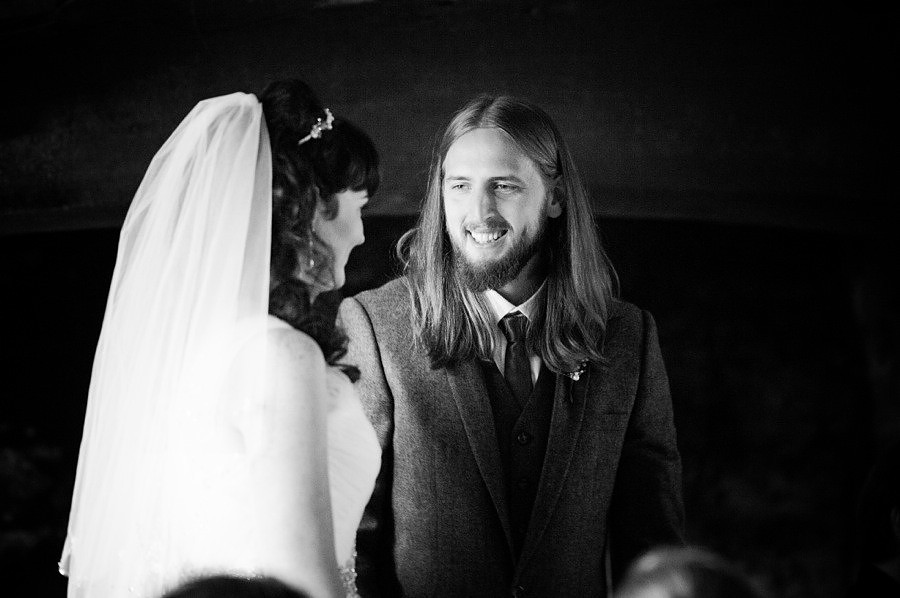 Bride and groom looking at each other during their wedding at Gwydir Castle, Conwy. North Wales Wedding photographer, Celynnen Photography