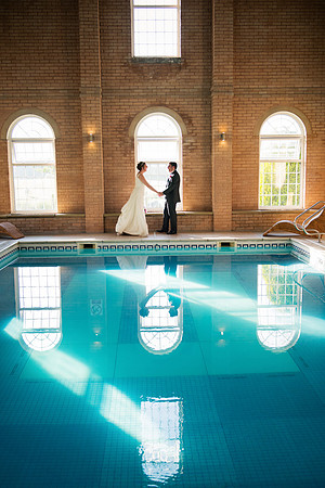 Rhian and Matt Posing Behind the Pool