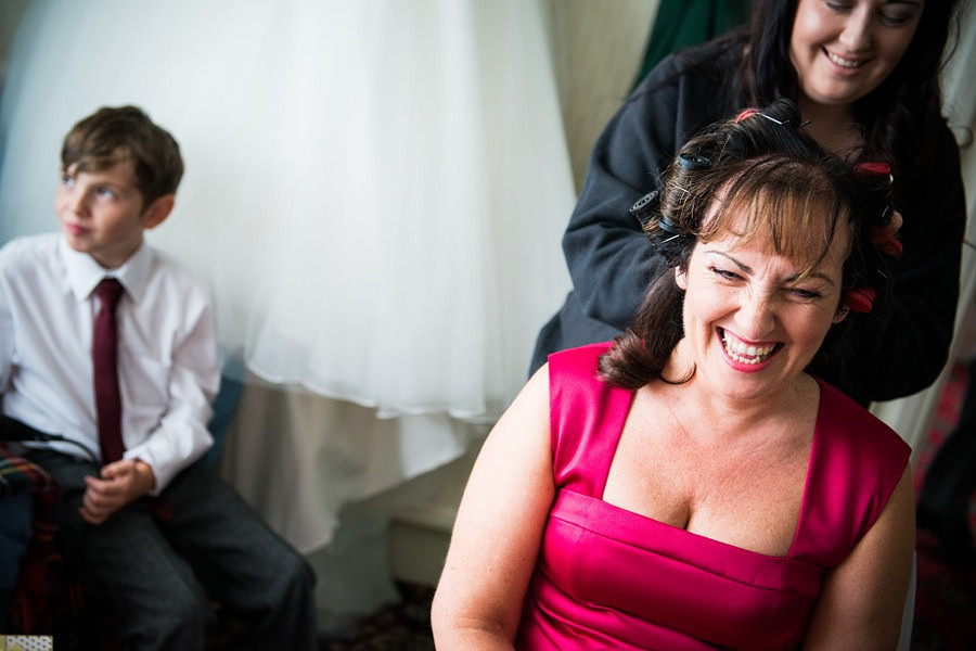 Mother of the bride getting ready for her daughter