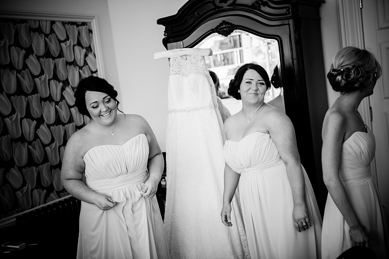 Black and white image of bridesmaids at a wedding in Chateaux Rhianfa, Anglesey. Wedding Photographer, Celynnen Photography