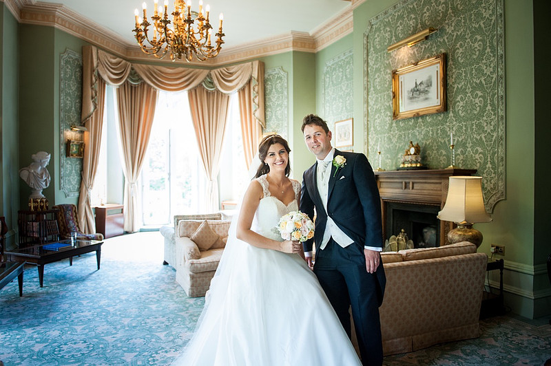 Portrait of the bride and groom on their wedding day at Tre-Ysgawen.
