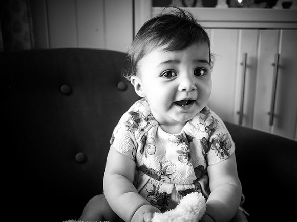 Portrait of a little girl from a bump to baby photoshoot
