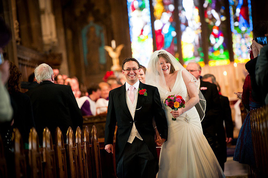 The happy bride and groom exciting church