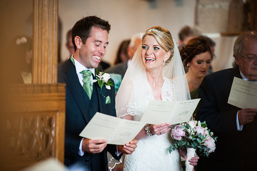 Bride and groom enjoying the wedding ceremony in Chester