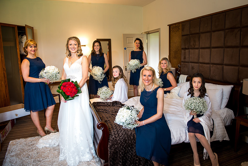 Portrait of the bride and the bridal party at a wedding in Davenham.