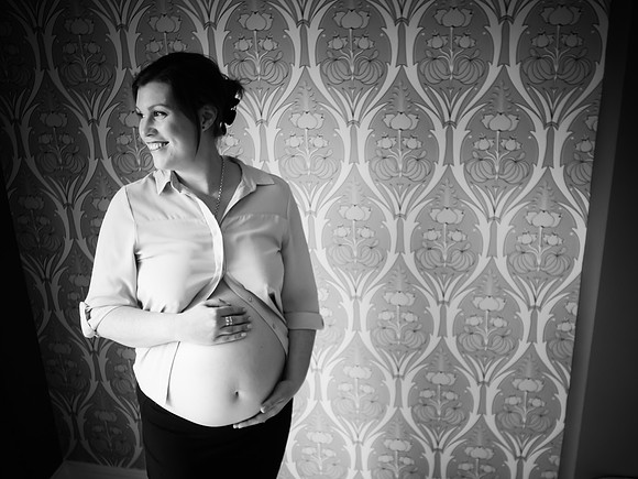 Black and white portrait of pregnant woman during her bump to baby photoshoot