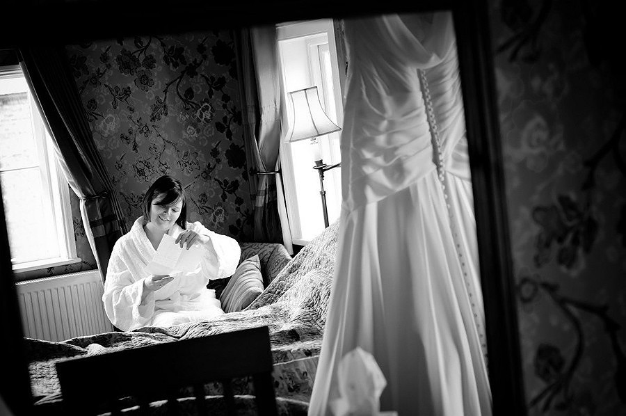 Bride reading love not from her groom to be