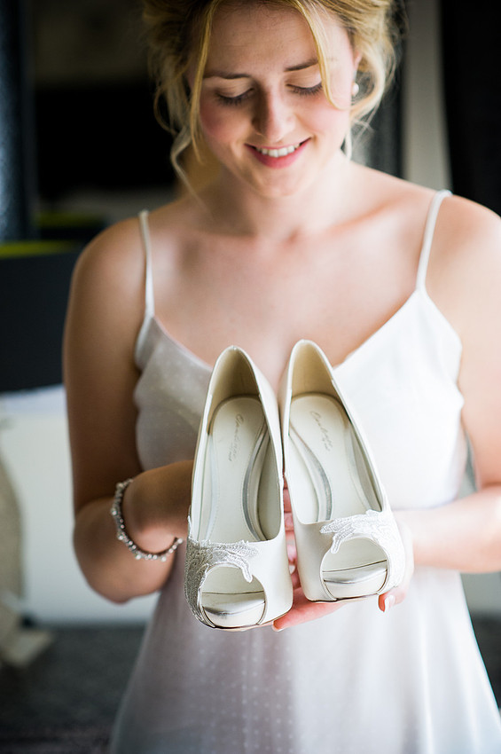 Bride and her shoes for her wedding at Chateaux Rhianfa, Anglesey. Wedding Photographer, Celynnen Photography