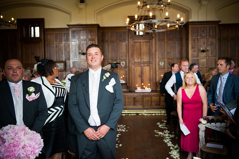 The groom waiting for his bride at a wedding in Chateaux Rhianfa, Anglesey. Wedding Photographer, Celynnen Photography