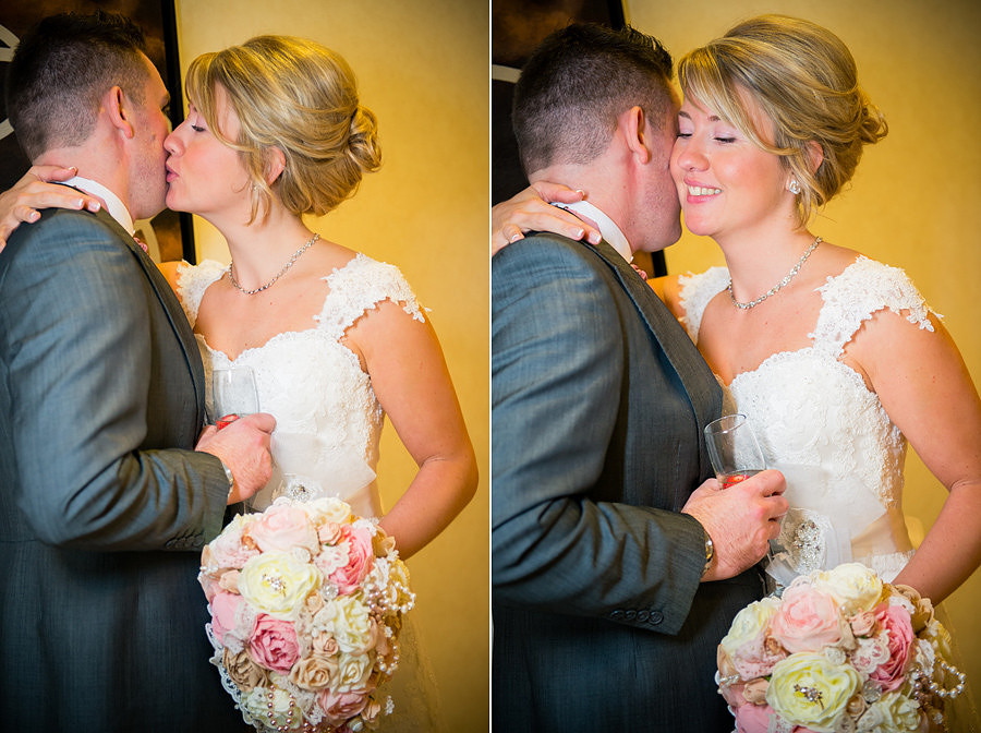 Bride and groom kissing after their Wedding at the Deganwy Quay. Wedding Photographer: Celynnen Photography