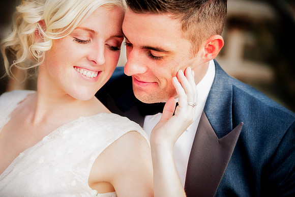 military Bride and groom cuddling at their wedding in Nant Gwrtheyrn