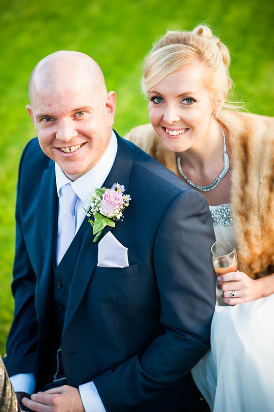 Bride and Groom smiling together by North Wales Wedding Photographer Celynnen Photography