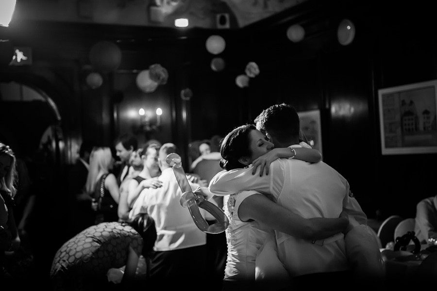 Bride and Groom hugging on dance floor by Wedding Photographer Celynnen Photography