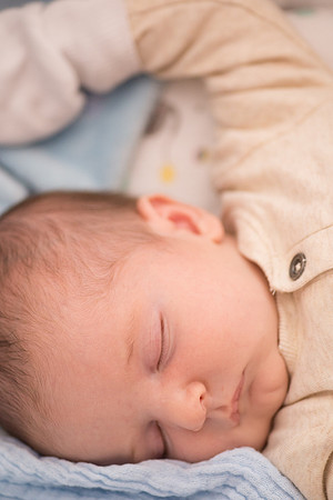 Portrait of a newborn baby from a bump to baby photoshoot in North Wales