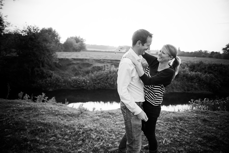 Black and white image of a couple enjoying their pre wedding photo shoot with Celynnen Photography.