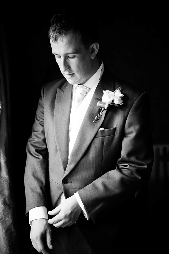 Groom Fixing his Cuff by North Wales Wedding Photographer Celynnen Photography