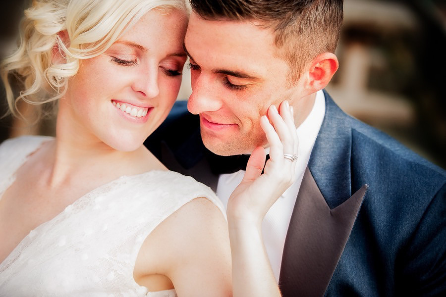 bride and groom at Nant Gwrtheyrn, hugging for a wedding photo