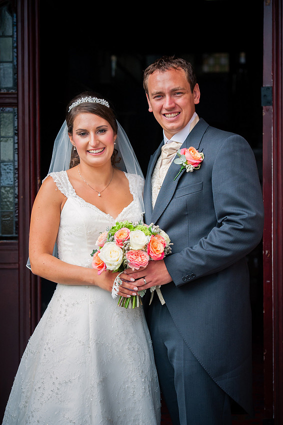 Wedding photographer Ruthin Celynnen Photography Couple outside of church