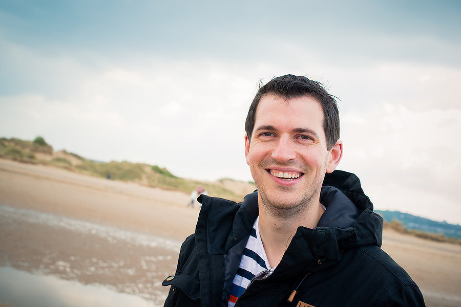 A happy man on his pre wedding photo shoot on Talacre Beach.