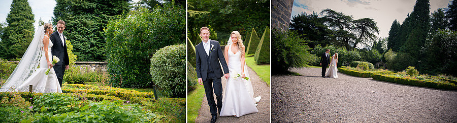 Bride and groom walking in the gardens at Gwydir Castle. Wedding Photographer: Celynnen Photography