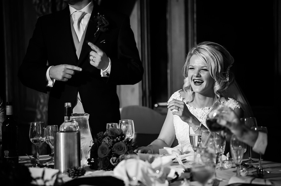 Bride and Groom happy at their evening reception by photographer Celynnen Photography