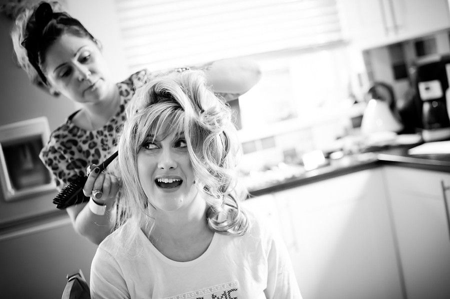Bride having hair done by North Wales Wedding Photographer Celynnen Photography