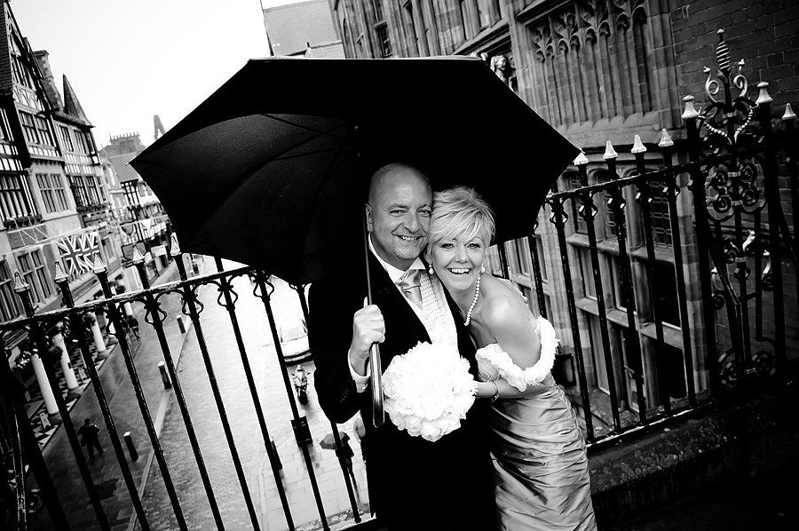 wedding portraits outside chester grosvenor under the clock