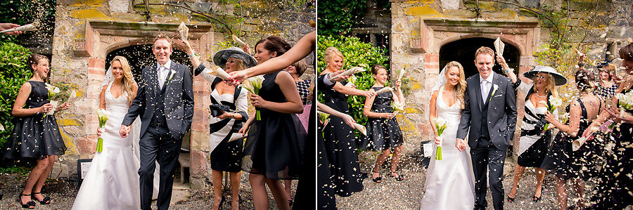 Confetti during a wedding at Gwydir Castle. Wedding Photographer: Celynnen Photography
