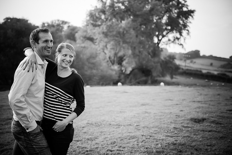 Black and white portrait of a couple on a pre wedding photoshoot.