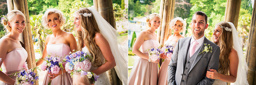 Bride, groom and bridesmaids smiling outside in the portmeirion plaza during their wedding