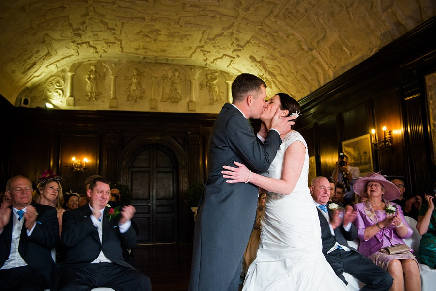 Bride and Groom Kiss at Wedding in Portmeirion by Photographer Celynnen Photography