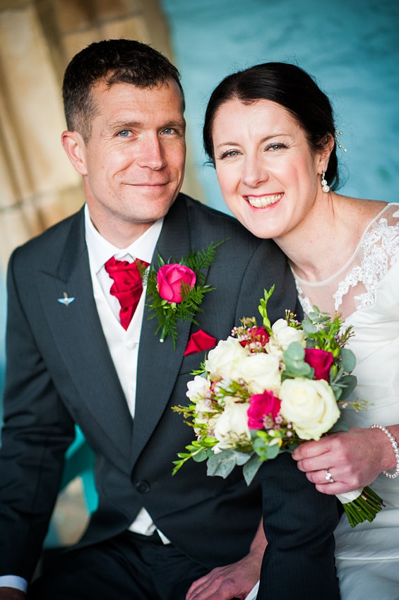 Bride and Groom Smiling Together on Wedding Day by Photographer Celynnen Photography 