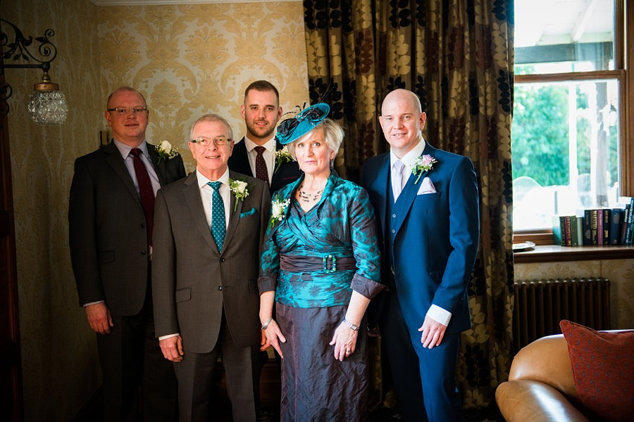 Groom and his parents at wedding by North Wales Wedding Photographer Celynnen Photography