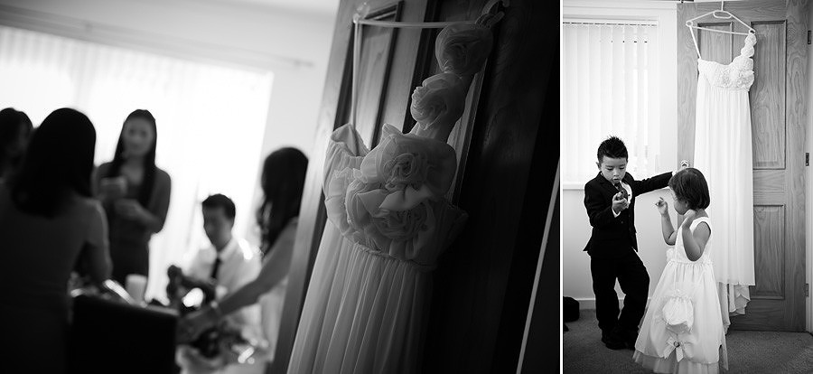 Bride and her bridesmaids preparing the wedding flowers. The wedding dress is hanging on the door. They are off to a wedding at the lion quays in oswestry, shropshire.