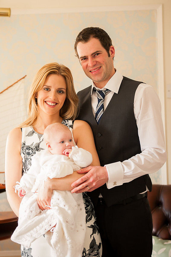 Amelia being held by her parents Bryn & Rebecca after the Christening at Trearddur Bay Hotel, Anglesey.