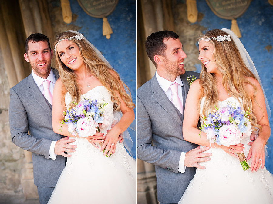 Bride and groom smiling on the plaza in Portmeirion. Wedding photographer: Celynnen Photography