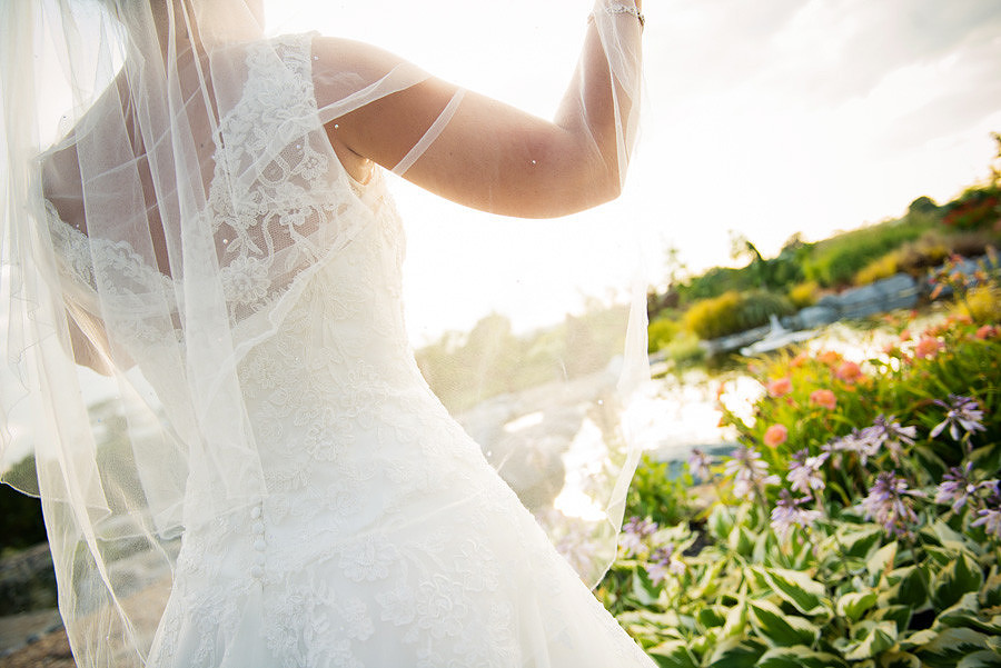 Image of the back of the bride at a wedding at Grosvenor Pulford