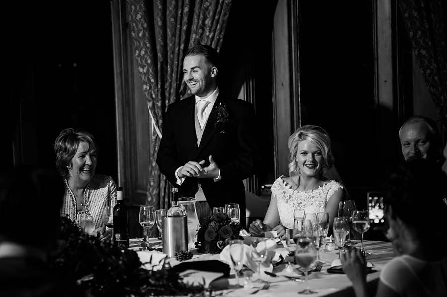 Groom giving speech at wedding by photographer Celynnen Photography