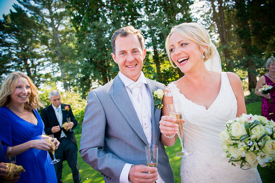 Bride and groom on the grounds of plas newydd anglesey
