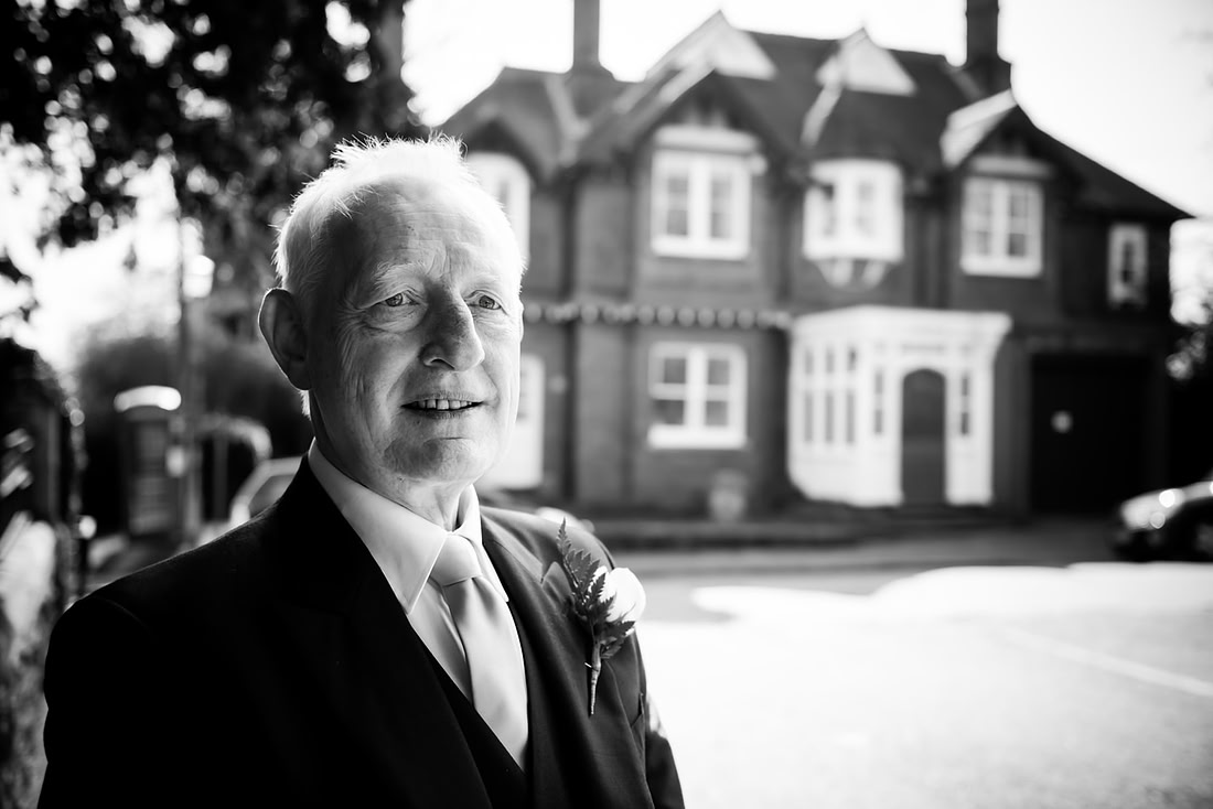 Black and white image of the father of the bride at a wedding in Buckinghamshire.