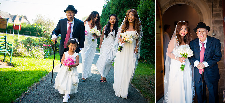 Bride and her father walking to the church for her wedding in oswestry, shropshire